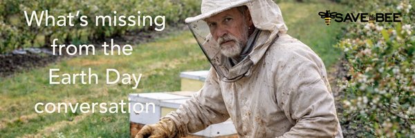 A beekeeper with bees and blueberries on Earth Day 2026
